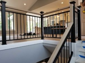 gallery_vertical-spindle-wood-capped-newel-posts-metal-railing-grand-rapids-mi-prosource-metalworks